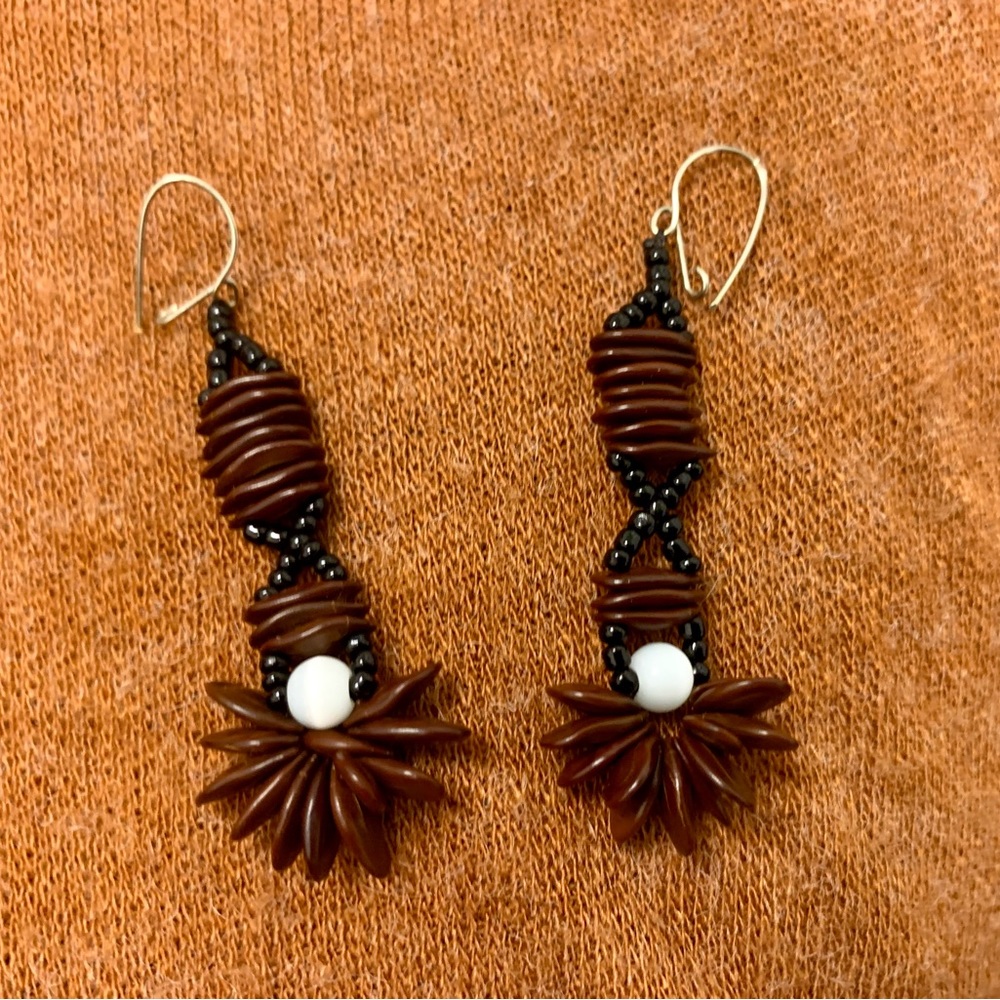 Dangle wooden and beaded earrings.